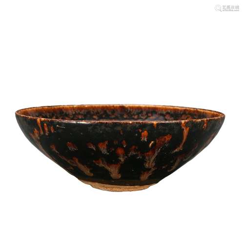 A BROWN-GLAZED BOWL