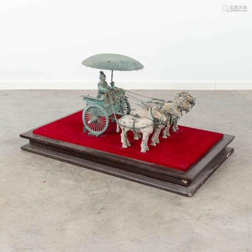 A Chinese horse-drawn carriage with 4 horses, made of bronze...