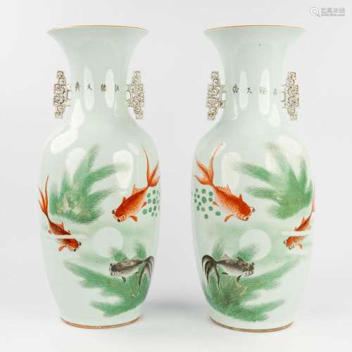 A pair of Chinese vases, Famille Verte, decorated with koi. ...