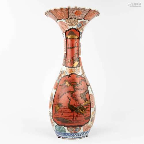 A Japanese Imari vase with a decor of cranes and landscapes....