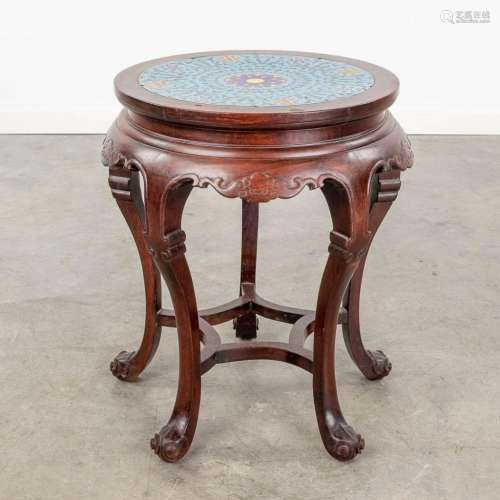 An Oriental stand, hardwood and finished with a cloisonné to...