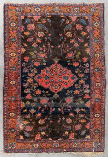 An Oriental hand-made carpet, Tabriz. (L:187 x W:130 cm)