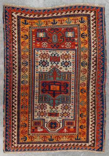 An oriental hand-made carpet. Kazak Caucasian. (L:175 x W:12...