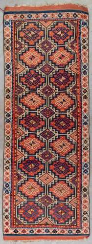 An oriental hand-made carpet. Kazak Caucasian. (L:315 x W:10...