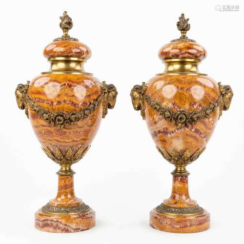 A pair of marble cassolettes mounted with bronze in Louis XV...