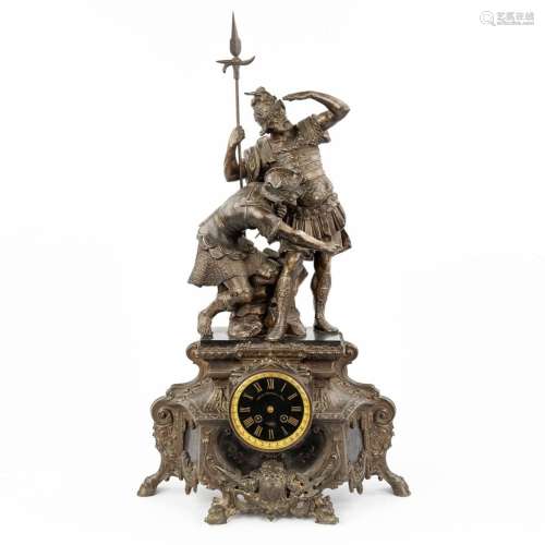 A mantle clock 'The Spanish Warriror's' made of spelter. (W:...
