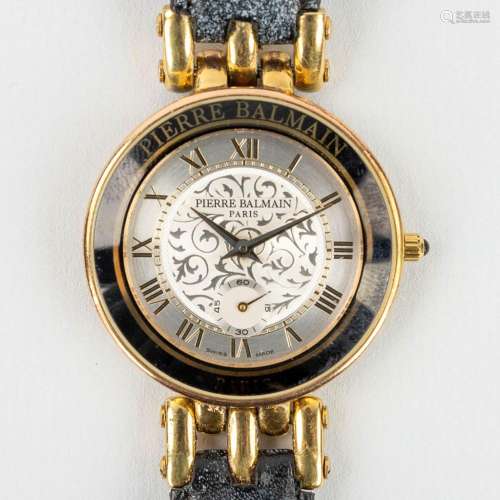Pierre Balmain, a unisex wristwatch. Gold plated on a leathe...