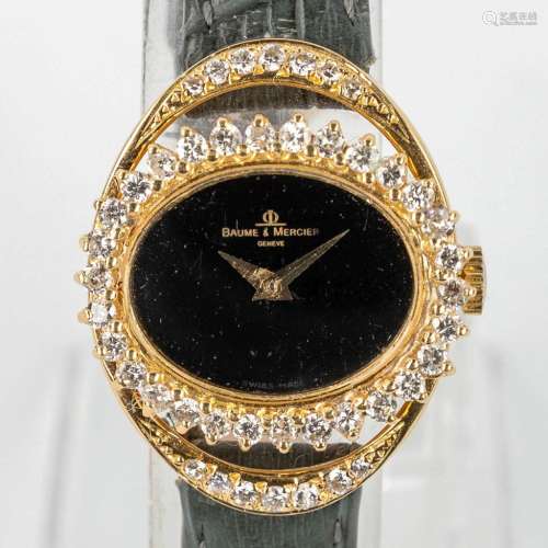 Baume et Mercier, a ladies wristwatch made of 18-karat yello...