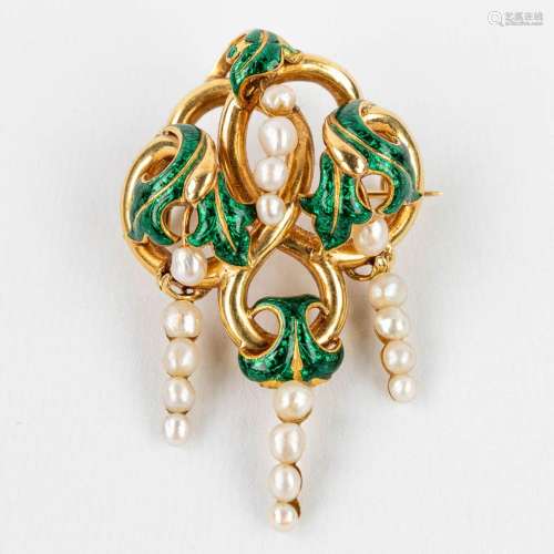 A brooch made of 18-karat gold, decorated with 18 pearls and...