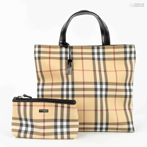 Burberry, a handbag made of vinyl with a smaller bag. Circa ...