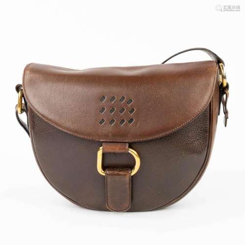 Delvaux, a handbag made of brown leather with gold-plated el...