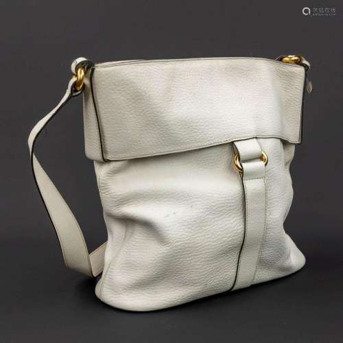 Delvaux, a handbag made of white leather with gold-plated el...