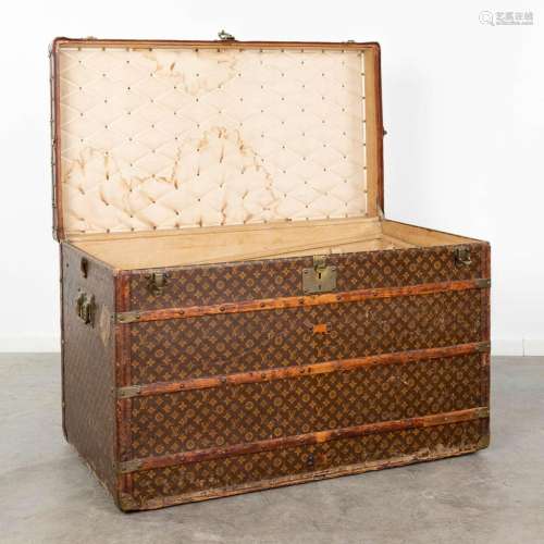 Louis Vuitton, a large and antique suitcase. (L:63 x W:113 x...