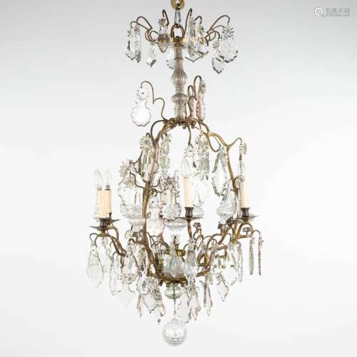 A large chandelier made of bronze and glass. 19th C. (H:130 ...