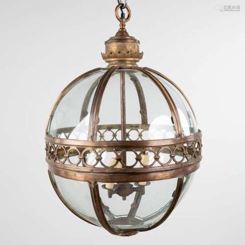 A lantern in the shape of a ball, made of glass and brass. 2...