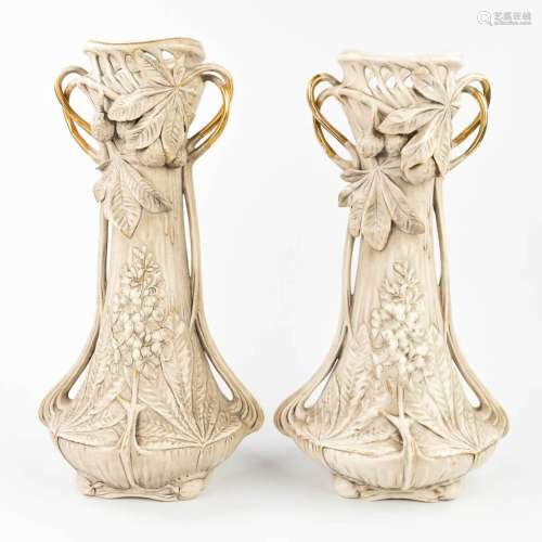 Royal Dux, a pair of vases made of faience in art nouveau st...