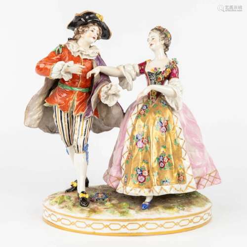 A porcelain figurine 'Dancing Couple' with hand-painted deco...