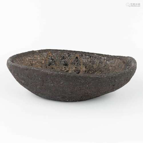 A brutalist bowl made of glazed ceramics, probably made by Y...