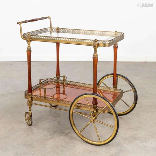 A vintage 'Bar Cart' or drinks trolley, made of brass and ma...