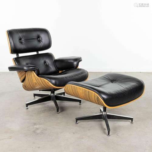 A vintage lounge chair and ottoman. Circa 1980. (L:85 x W:88...