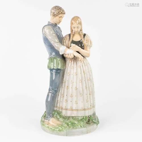 Royal Copenhagen Denmark, a statue of a man and a lady (H:50...