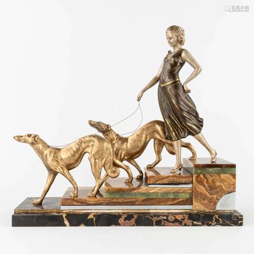 Walking the greyhounds down the stairs', a statue made in ar...