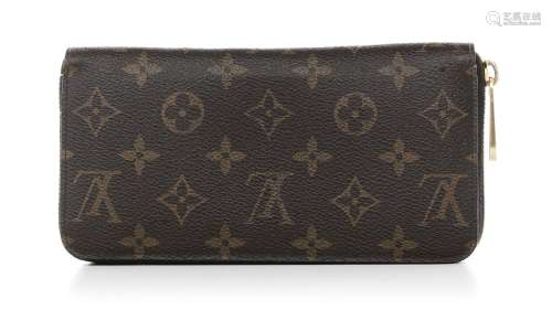 Louis Vuitton, porte feuille Zippy en toile enduite Monogram...