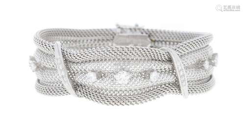 Bracelet or gris 750 ajouré serti de diamants taille brillan...