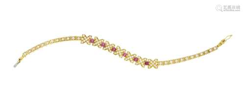 Bracelet or 750 à motif de croix serti de rubis et de diaman...