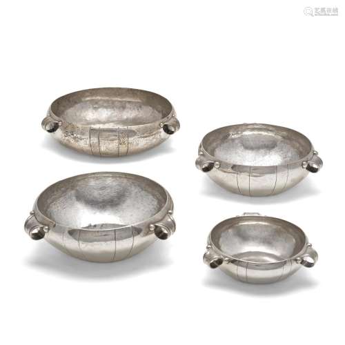 FOUR MEXICAN STERLING SILVER BOWLS WITH THREE LOOP HANDLES, ...