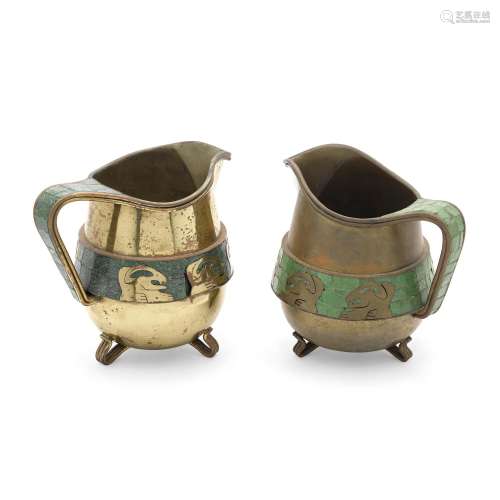 TWO SIMILAR MEXICAN BRASS AND MOSAIC FOOTED PITCHERS, ONE BY...