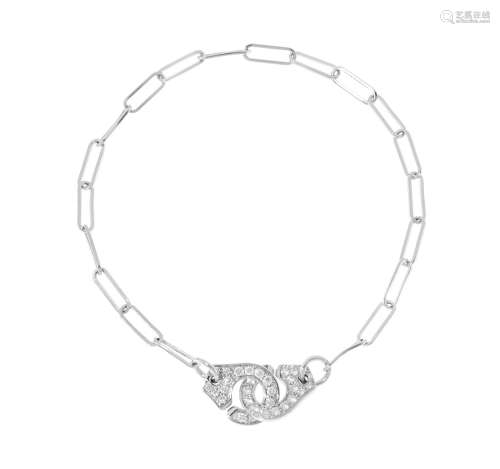 Dinh Van, Menottes, bracelet or gris  750 serti de diamants ...