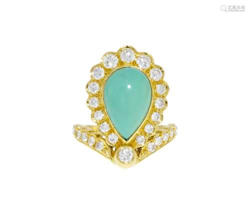 Bague or 750 sertie d'une turquoise entourée de diamants tai...