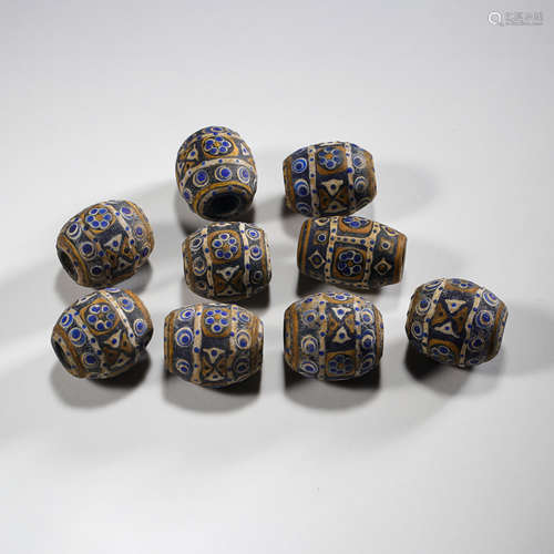 A GROUP OF GLASS BEADS FROM THE HAN DYNASTY, CHINA