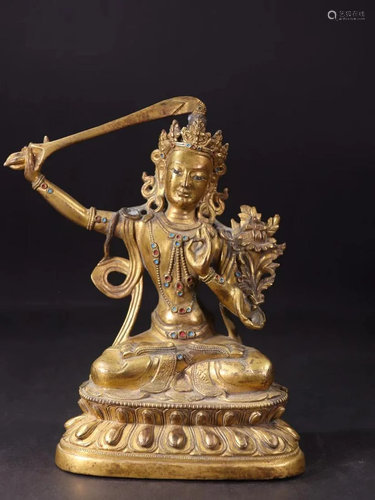 A Gilt Bronze Seated Guanyin Statue