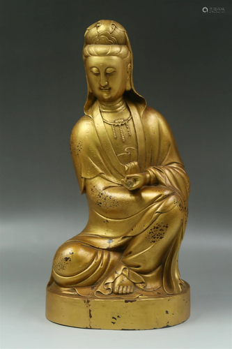 A Gilt Wooden Seated Guanyin Statue