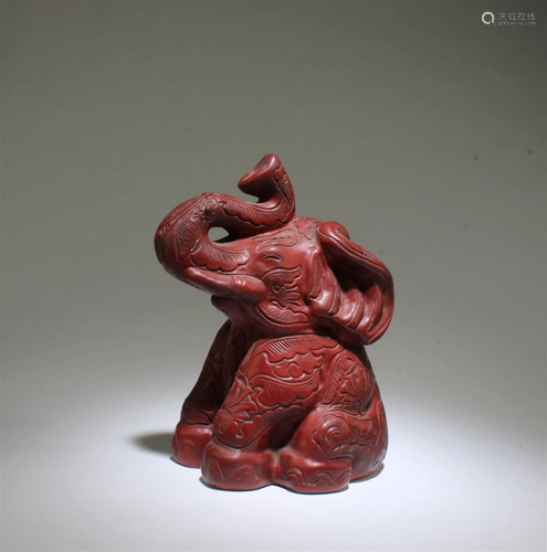 A Cinnabar Lacquer Elephant Figurine