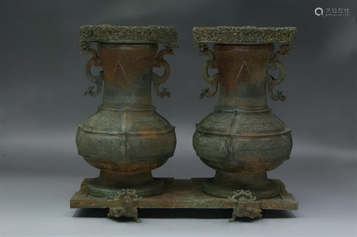 A Group of Two Bronze Vases