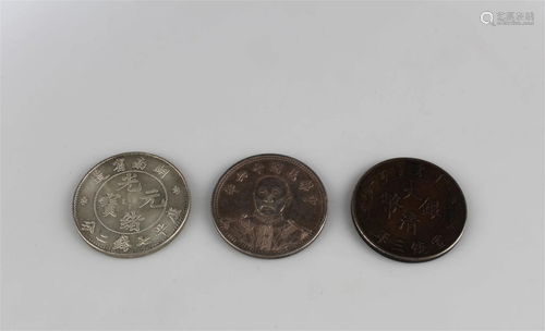 A Group of Three Coins