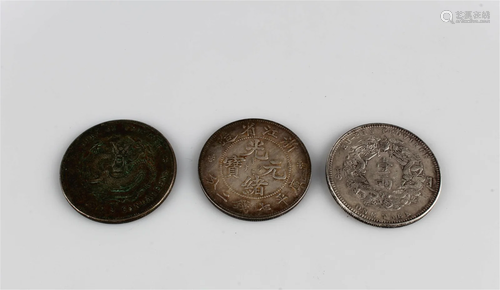 A Group of Three Coins