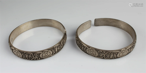 A Pair of Chinese Carved Bangles