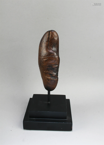 A Carved QiMu Sculpture