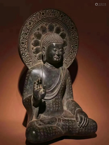 A Carved Stone Seated Buddha Statue