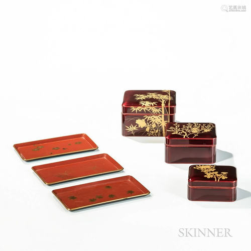 Two Sets of Red-lacquered Boxes and Dishes, Japan, a rectang...