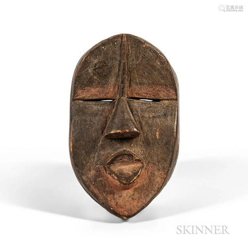 Small Dan Mask, Ivory Coast, hollowed-out form, pierced arou...