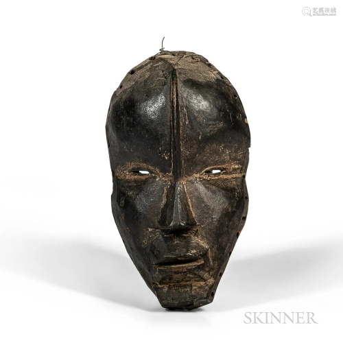 Dan Face Mask, hollowed-out form, pierced around the rim, wi...