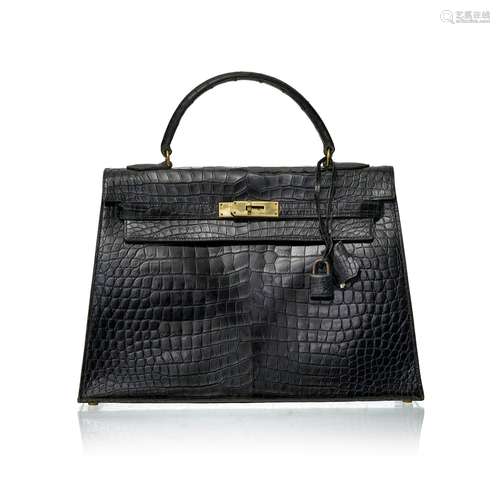 Hermès, sac Kelly 32 en crocodile porosus noir, bouclerie pl...