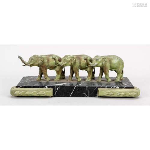 3 striding elephants on a marb