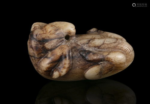 A JADE CARVING OF A ‘ROLLING’ HORSE OR RECUMBENT HORSE, MǍ 马...
