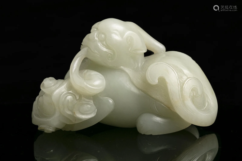 A JADE CARVING OF A PIXIE / BIXIE CHINA, QING DYNASTY Offere...